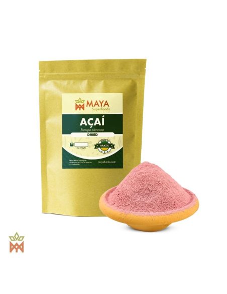 Açaí aus Brasilien (Euterpe oleracea) – Beutel von Maya Superfoods und rosaviolettes Fruchtpulver in einer gelben Tonschale