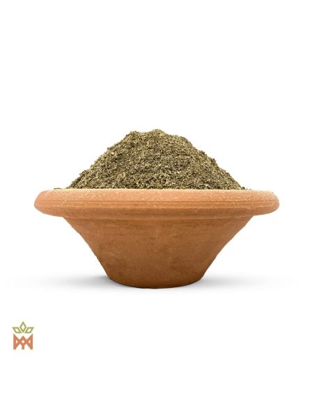 Peruanische Muña (Minthostachys setosa) – feines, olivbraunes zerkleinertes Kraut in einer Tonschale