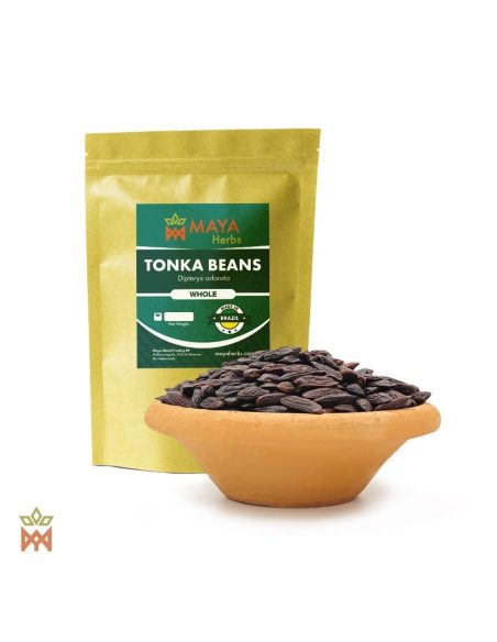 Tonkabohnen – Beutel von Maya Herbs und ganze Samen von Dipteryx odorata in einer Tonschale