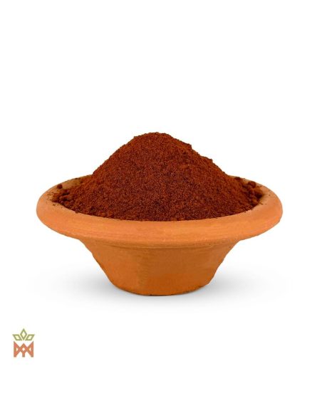 Huanarpo Macho aus Peru – Gemahlene Bulben, Jatropha macrantha – rotbraunes Pulver in Terrakottaschale